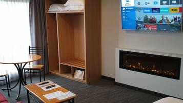 Suite, 1 King Bed, Non Smoking, Kitchenette | Living area | Smart TV, Netflix, streaming services