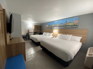 Suite, Multiple Beds, Non Smoking | Premium bedding, down duvets, pillow-top beds, desk - Days Inn & Suites by Wyndham Texas City (Texas City)