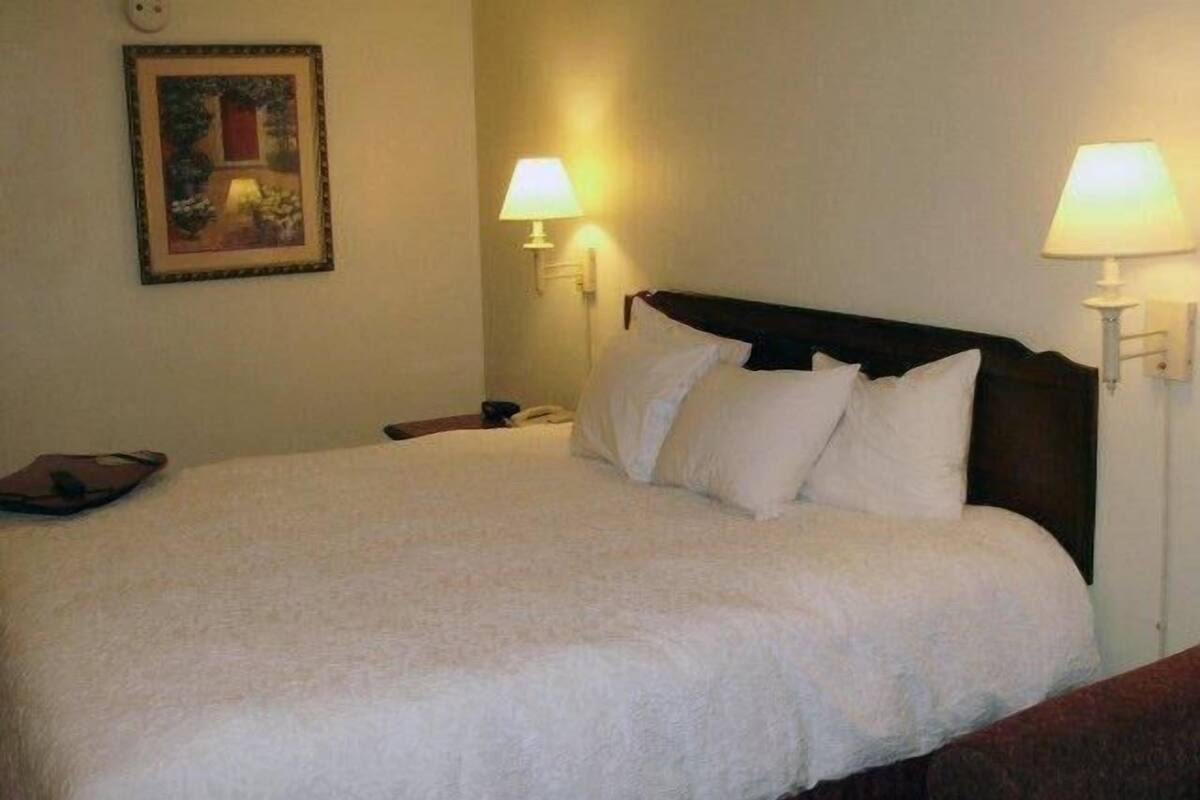 Premium bedding, down comforters, Tempur-Pedic beds, desk
