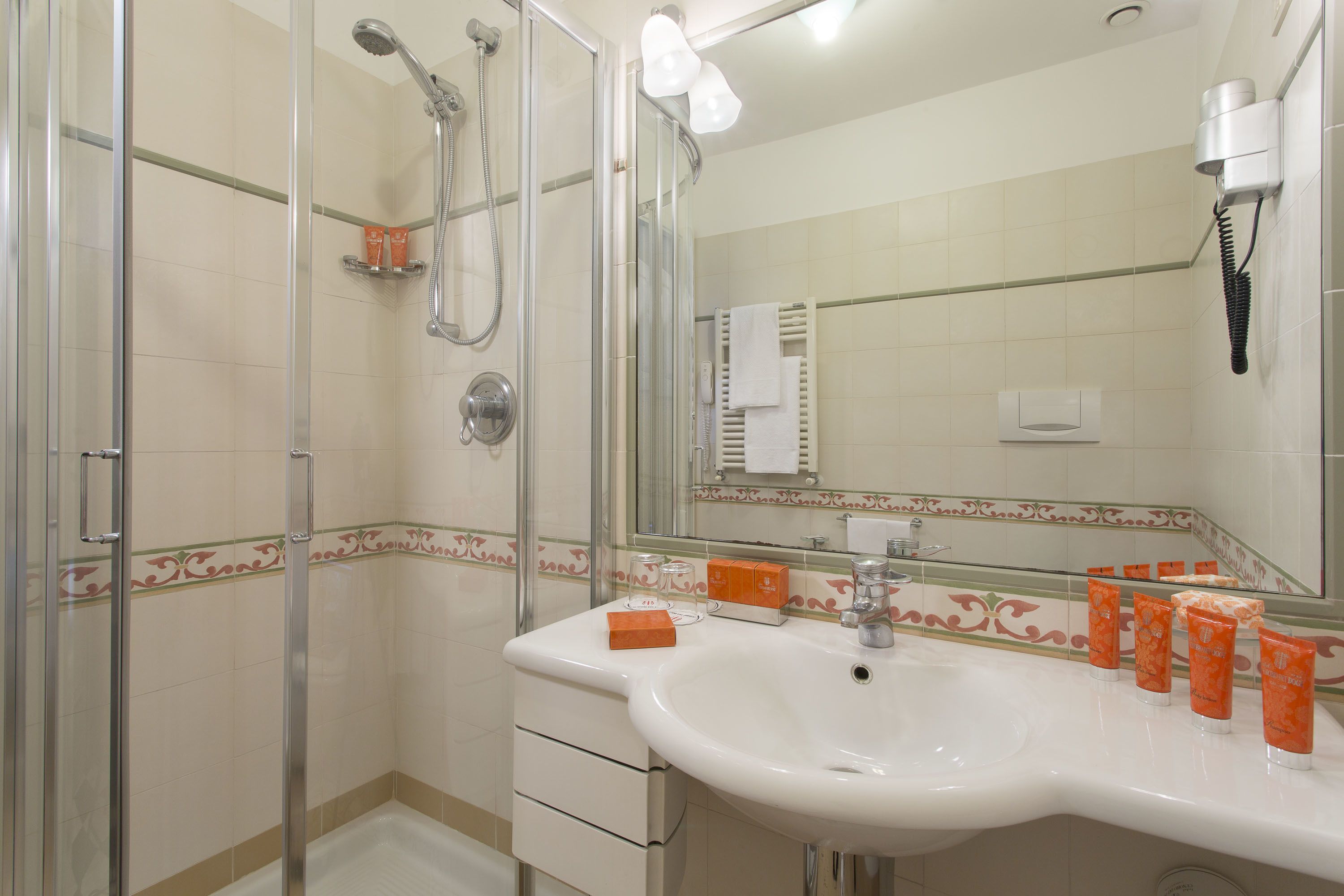 eco-friendly toiletries, hair dryer, bathrobes, slippers