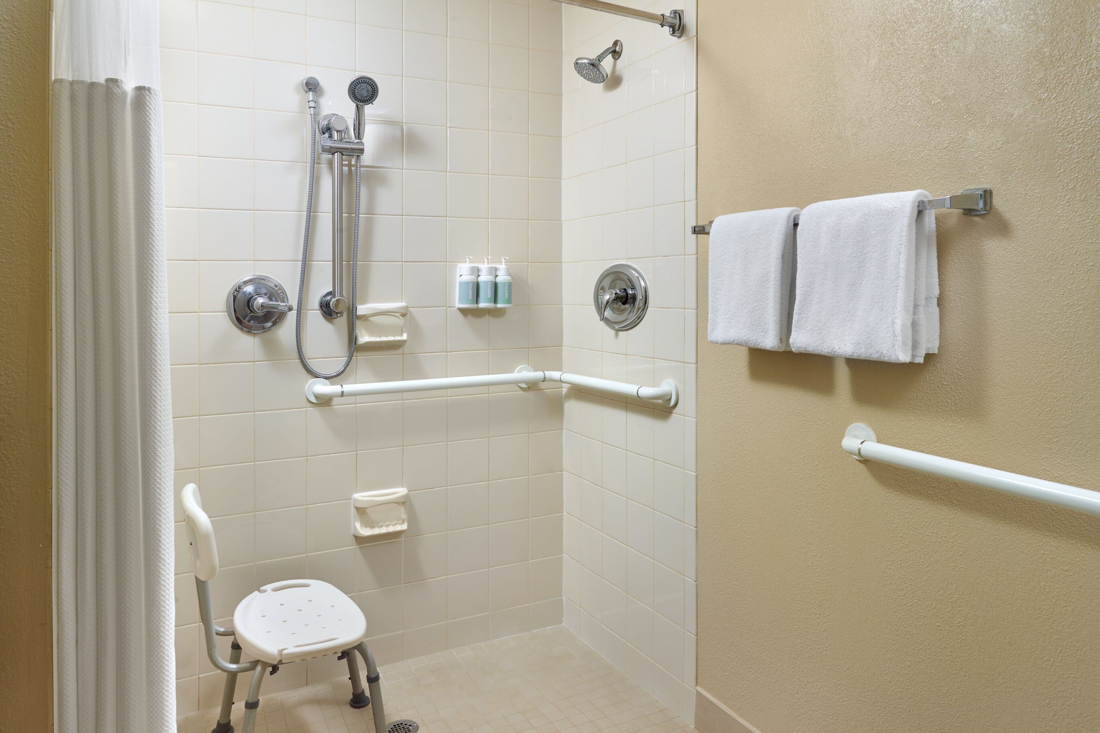 combined shower/bathtub, free toiletries, hair dryer, towels