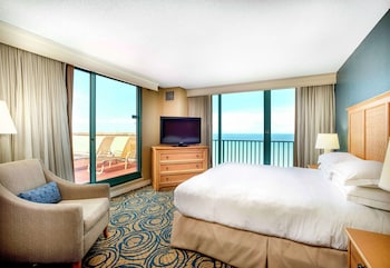 Suite, 1 King Bed, Terrace, Oceanfront | Premium bedding, pillowtop beds, in-room safe, desk at Hilton Daytona Beach Oceanfront Resort