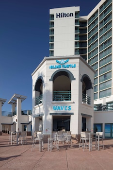 4 restaurants, breakfast, lunch, dinner served; local cuisine at Hilton Daytona Beach Oceanfront Resort