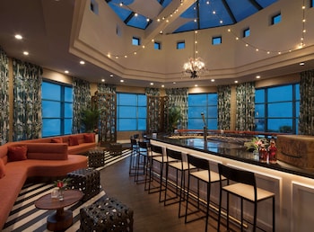 4 restaurants, breakfast, lunch, dinner served; local cuisine at Hilton Daytona Beach Oceanfront Resort