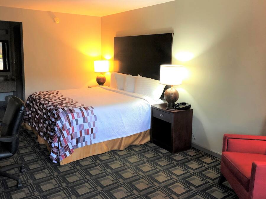 Desk, blackout drapes, cribs (free), WiFi (free)