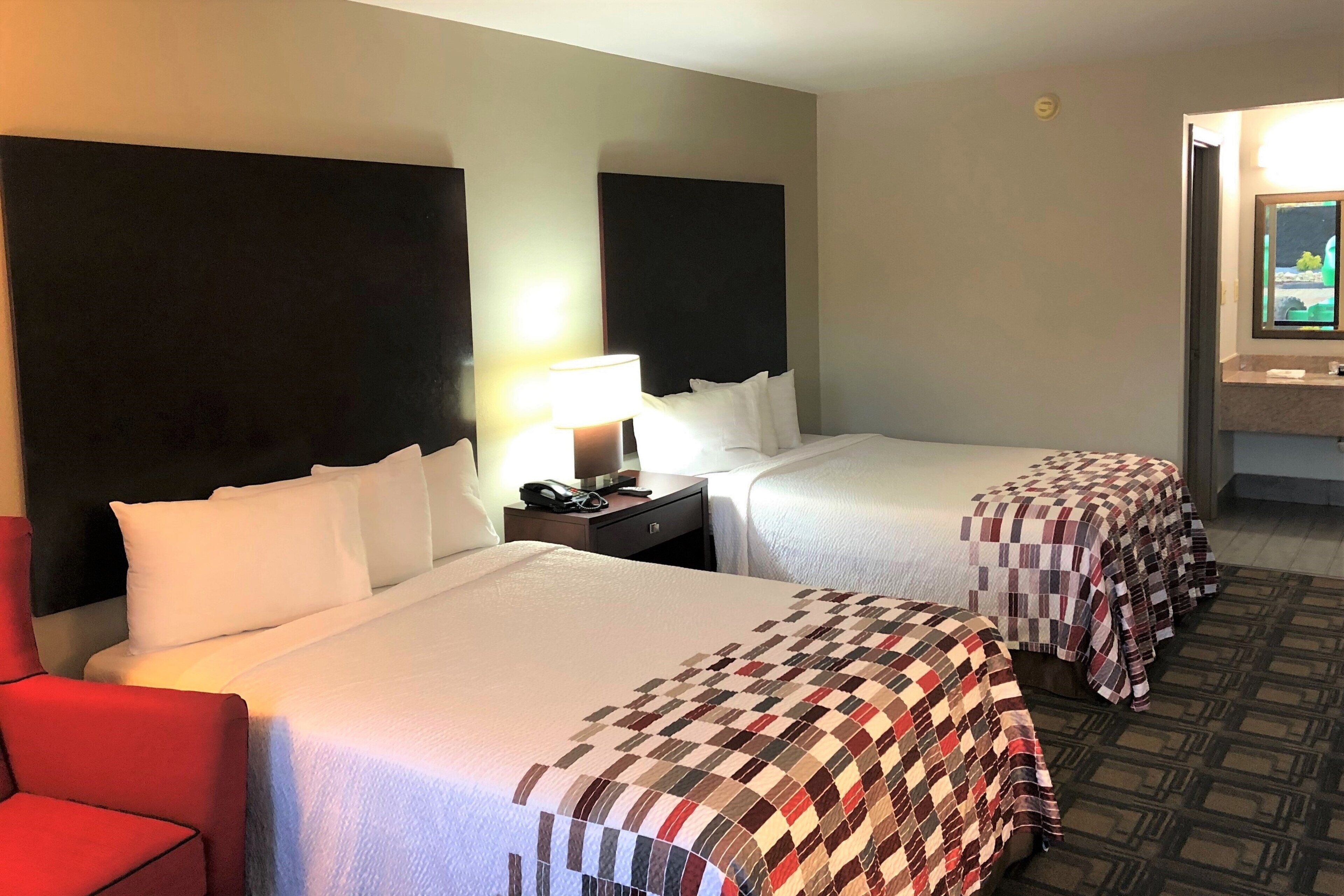 Desk, blackout curtains, free cots/infant beds, free WiFi