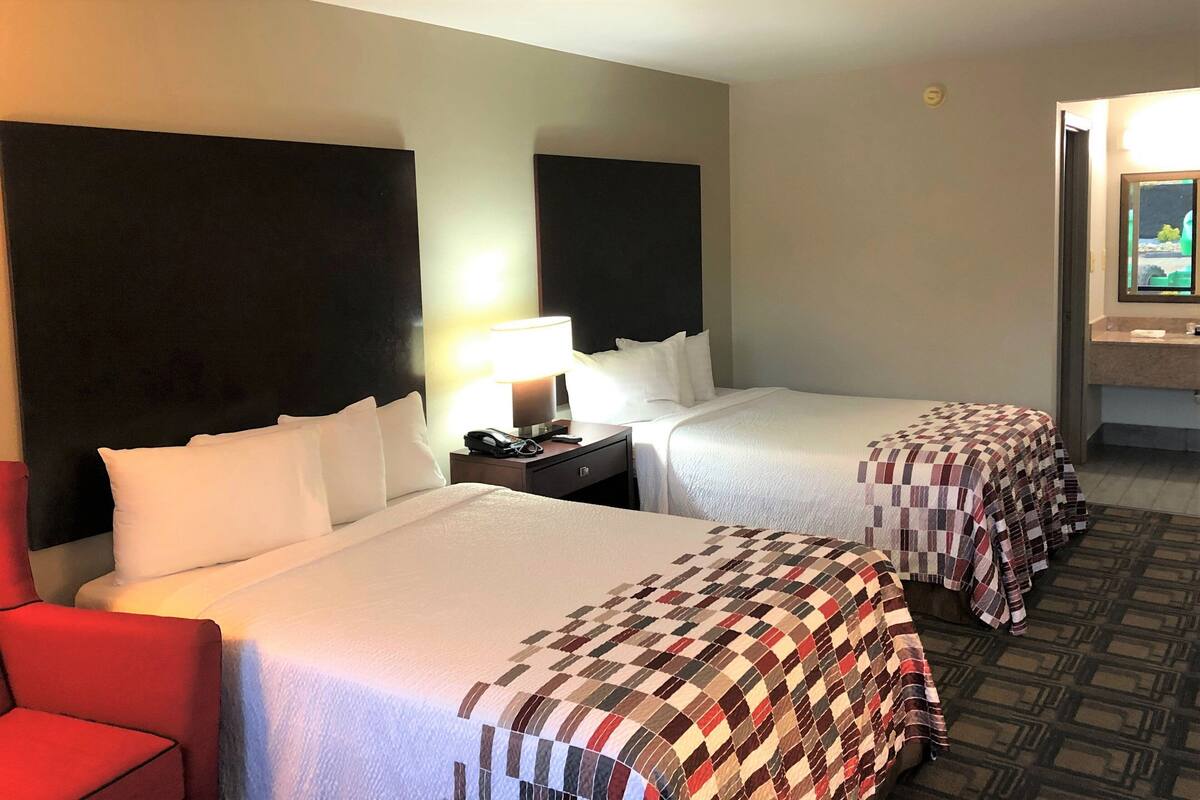 Deluxe Room, 2 Queen Beds, Non Smoking | Desk, blackout drapes, cribs (free), WiFi (free)
