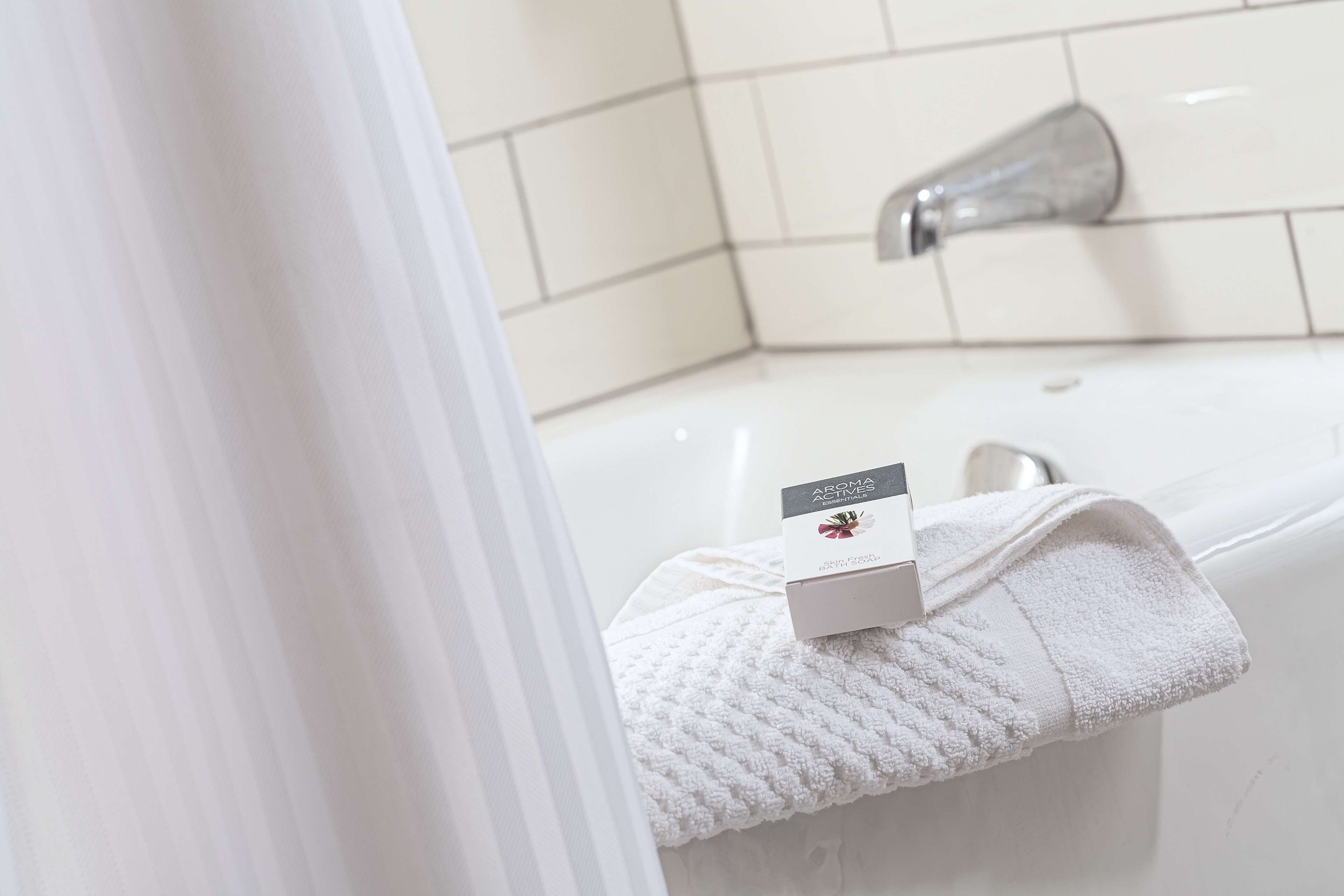 hair dryer, towels, soap, shampoo