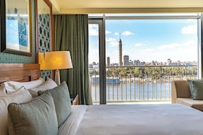 Egyptian cotton sheets, premium bedding, minibar, in-room safe