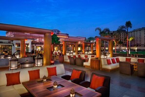 Dinner served, Middle Eastern cuisine, garden views 