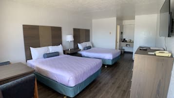 Tabla de planchar con plancha, wifi gratis, ropa de cama y despertador