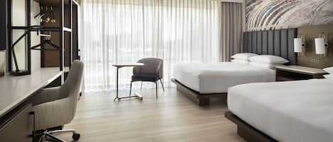 Premium bedding, pillow-top beds, desk, blackout curtains