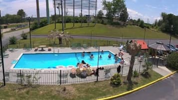 Seasonal outdoor pool, open 9:00 AM to 9:00 PM, sun loungers