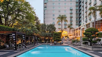 Outdoor pool, open 6:00 AM to 10:00 PM, free pool cabanas, pool loungers