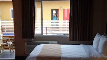 Standard Room, 2 Queen Beds, Balcony, Non Smoking | Desk, laptop workspace, blackout drapes, iron/ironing board