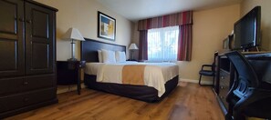 Desk, laptop workspace, blackout curtains, iron/ironing board - Quality Inn & Suites Anaheim At The Park (Anaheim)