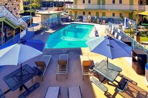Outdoor pool, open 10 AM to 10 PM, pool umbrellas, sun loungers