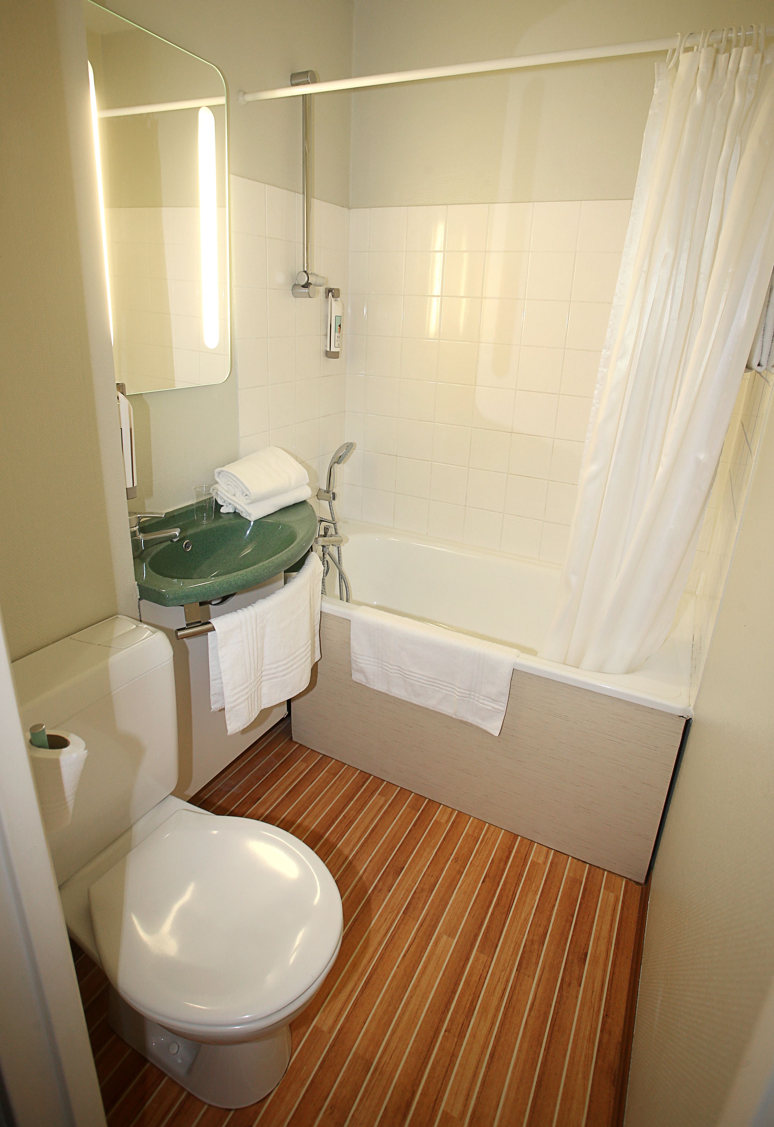 Standard Double Room, Multiple Beds | Bathroom | Bathtub, eco-friendly toiletries, hair dryer, towels