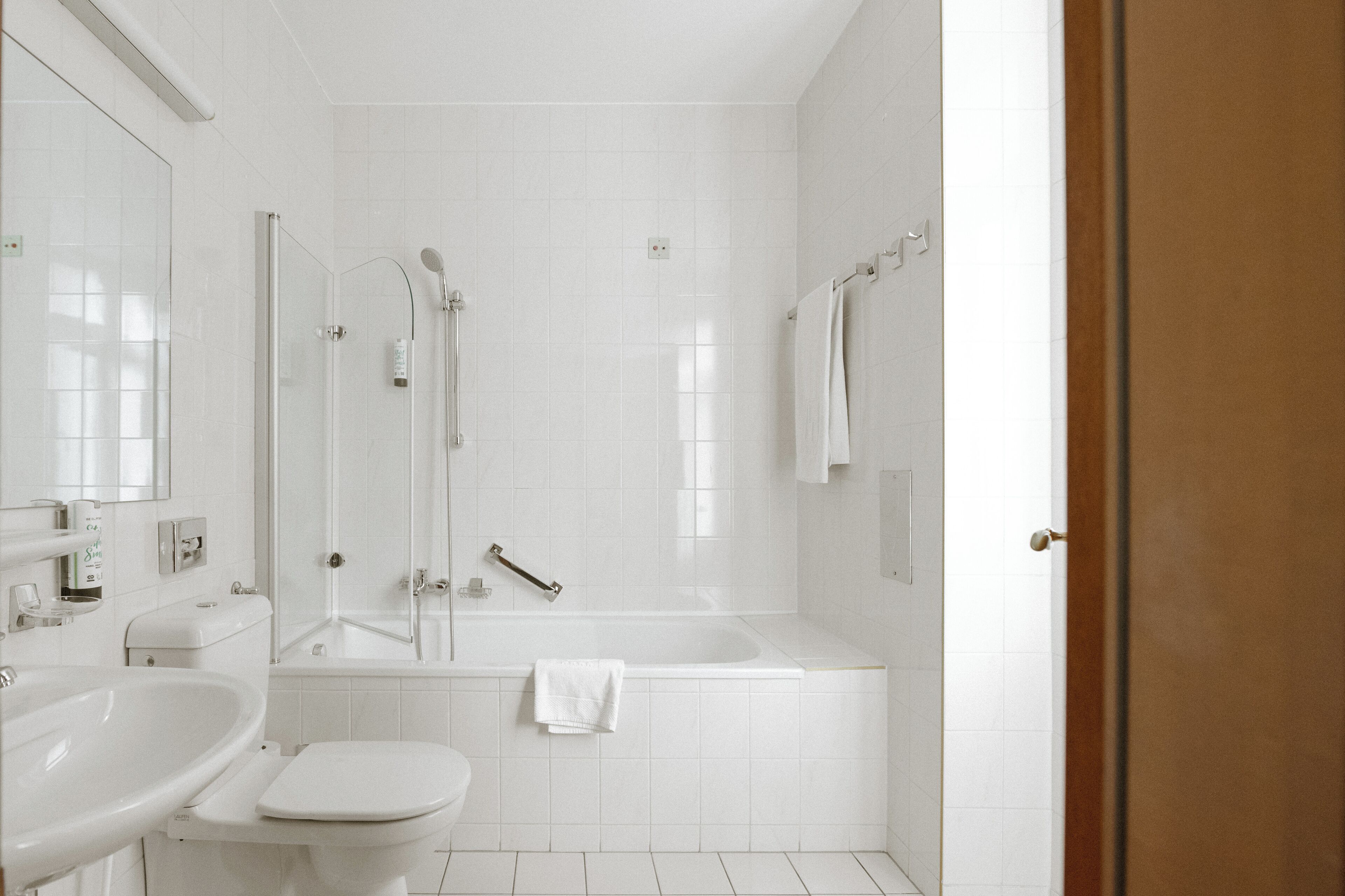 eco-friendly toiletries, hair dryer, towels