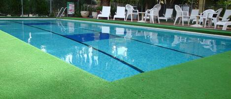 Outdoor pool, open 8:00 AM to 8:00 PM, sun loungers