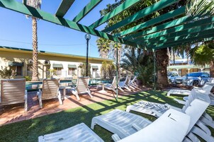 Outdoor pool, open 8:00 AM to 8:00 PM, sun loungers