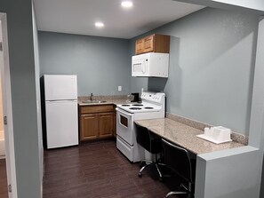 Premium Studio, 2 Queen Beds, Kitchen | Private kitchen | Fridge, microwave