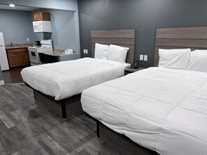Premium Studio, 2 Queen Beds, Kitchen | 1 bedroom, desk, iron/ironing board, free WiFi