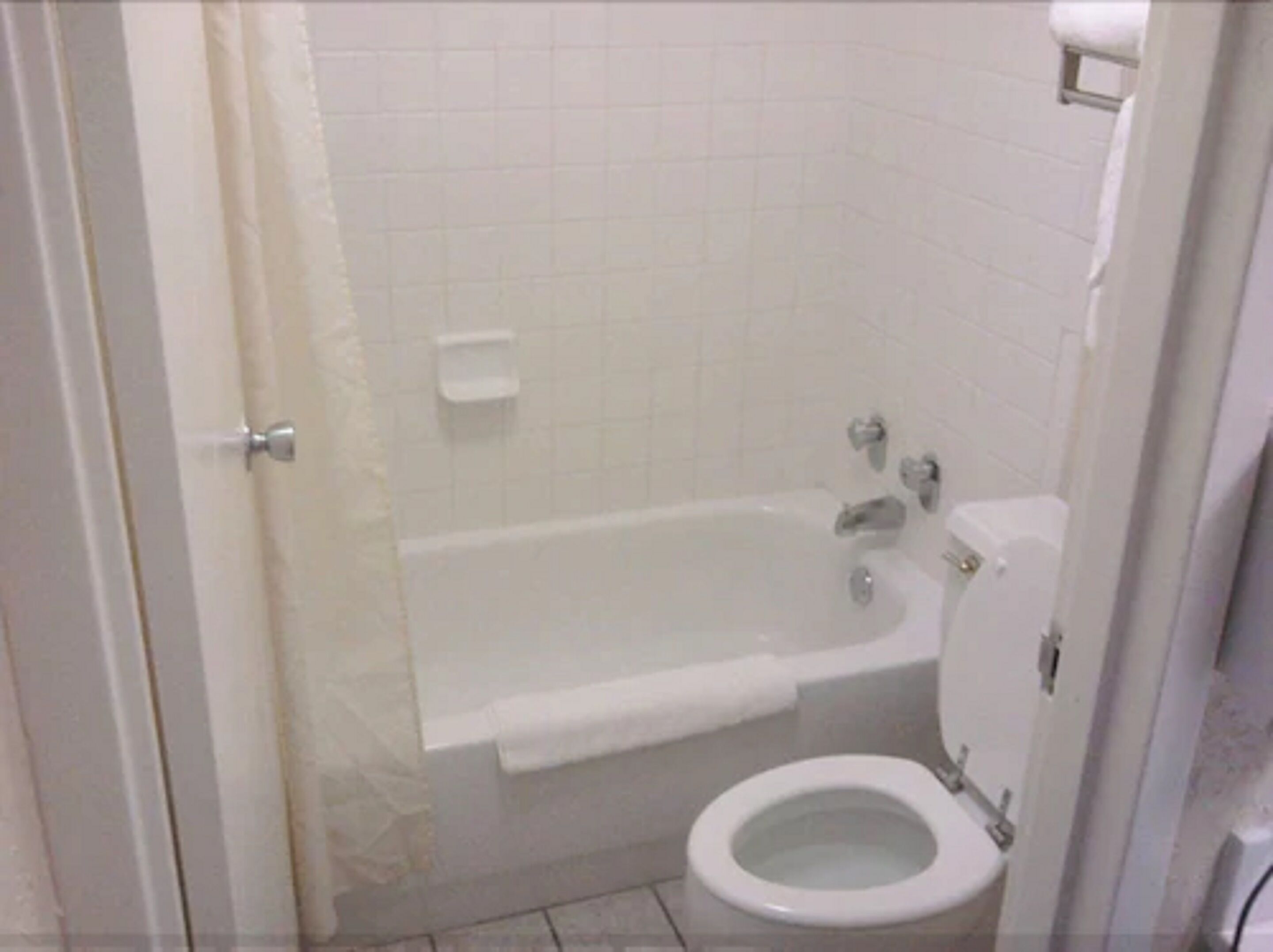 combined shower/bathtub, free toiletries, hair dryer, towels