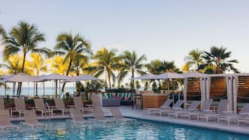 2 outdoor pools, open 7:00 AM to 10:00 PM, pool cabanas (surcharge)