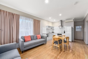 Superior Apartment, 2 Bedrooms | Living area | TV, DVD player