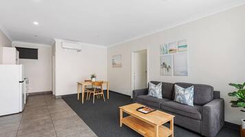 Superior Apartment, 1 Bedroom | Living area | TV, DVD player