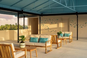 Outdoor pool, open 6:00 AM to 8:00 PM, pool umbrellas, pool loungers