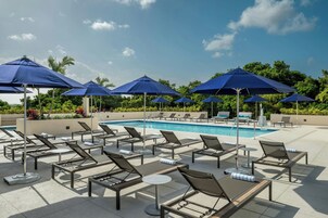 Outdoor pool, open 6:00 AM to 8:00 PM, pool umbrellas, pool loungers