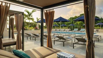 Outdoor pool, open 6:00 AM to 8:00 PM, pool umbrellas, pool loungers