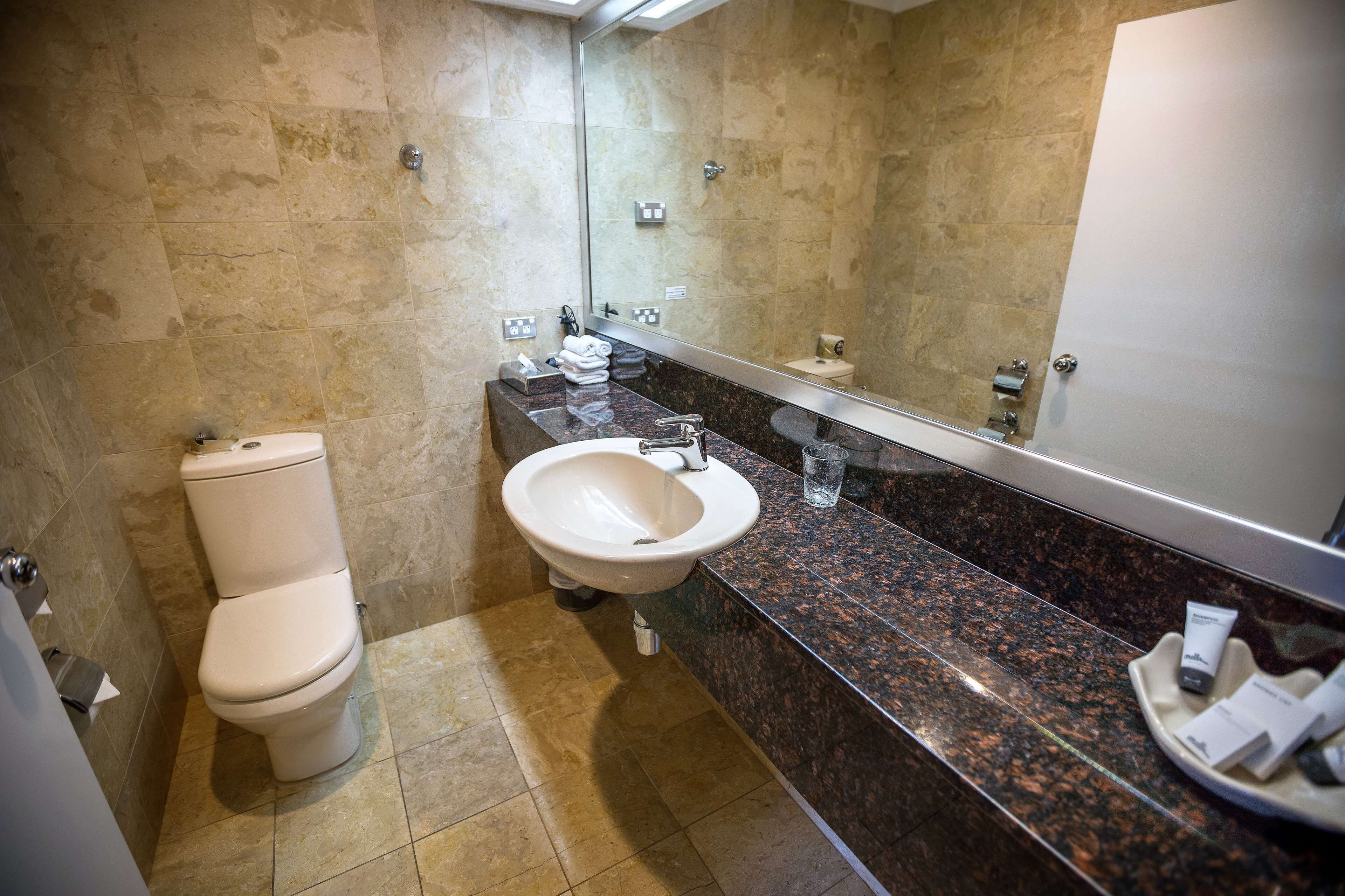 superior room, 1 king bed, non smoking, ground floor | premium bedding, pillow-top beds, minibar, in-room safe