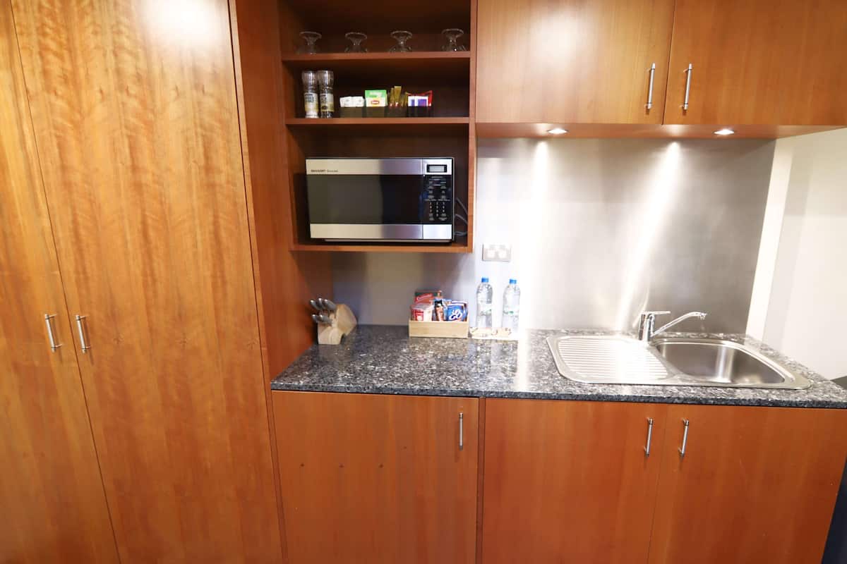 superior room, 2 queen beds, kitchenette, ground floor | premium bedding, pillow-top beds, minibar, in-room safe