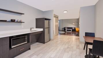 Suite, 1 King Bed | 1 bedroom, premium bedding, in-room safe, desk