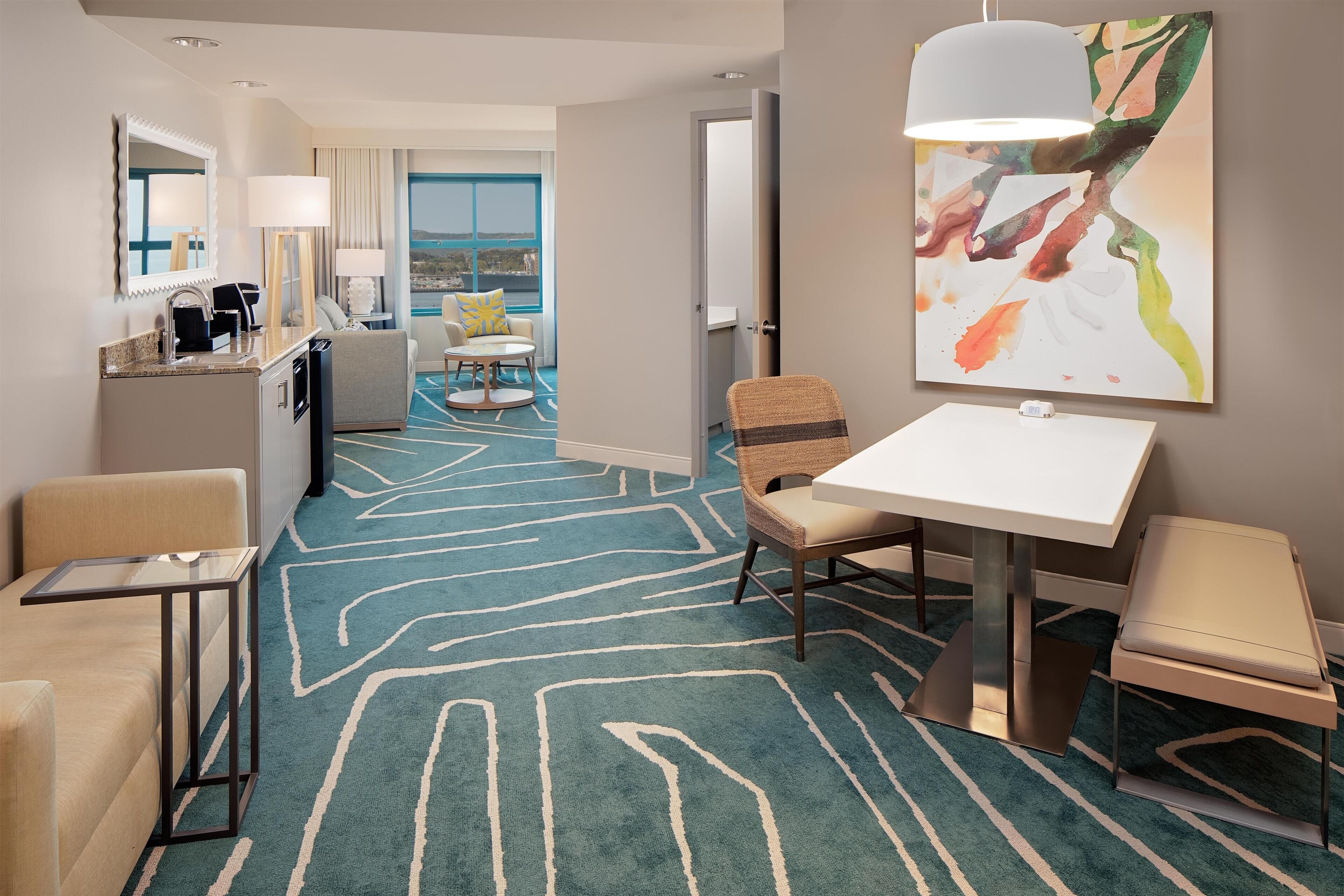 Suite, 1 King Bed, Bay View, Corner (Oversized) | Living area | 42-inch LCD TV with satellite channels, TV, video-game console
