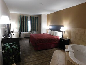 Deluxe Studio Suite, 1 King Bed, Non Smoking | In-room safe, desk, cots/infant beds, rollaway beds