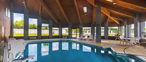 Indoor pool, open 10:00 AM to 9:00 PM, pool umbrellas