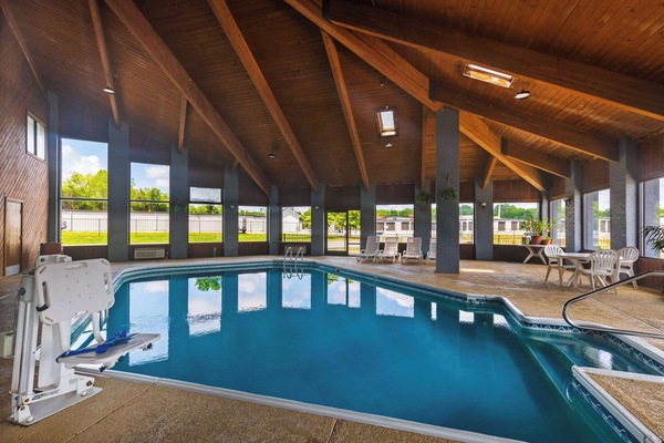 Indoor pool, open 10:00 AM to 9:00 PM, pool umbrellas