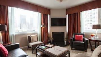 Suite, 1 chambre, cuisine | Salle de séjour | Télévision LED de 45 pouces avec chaßnes par cùble, télévision