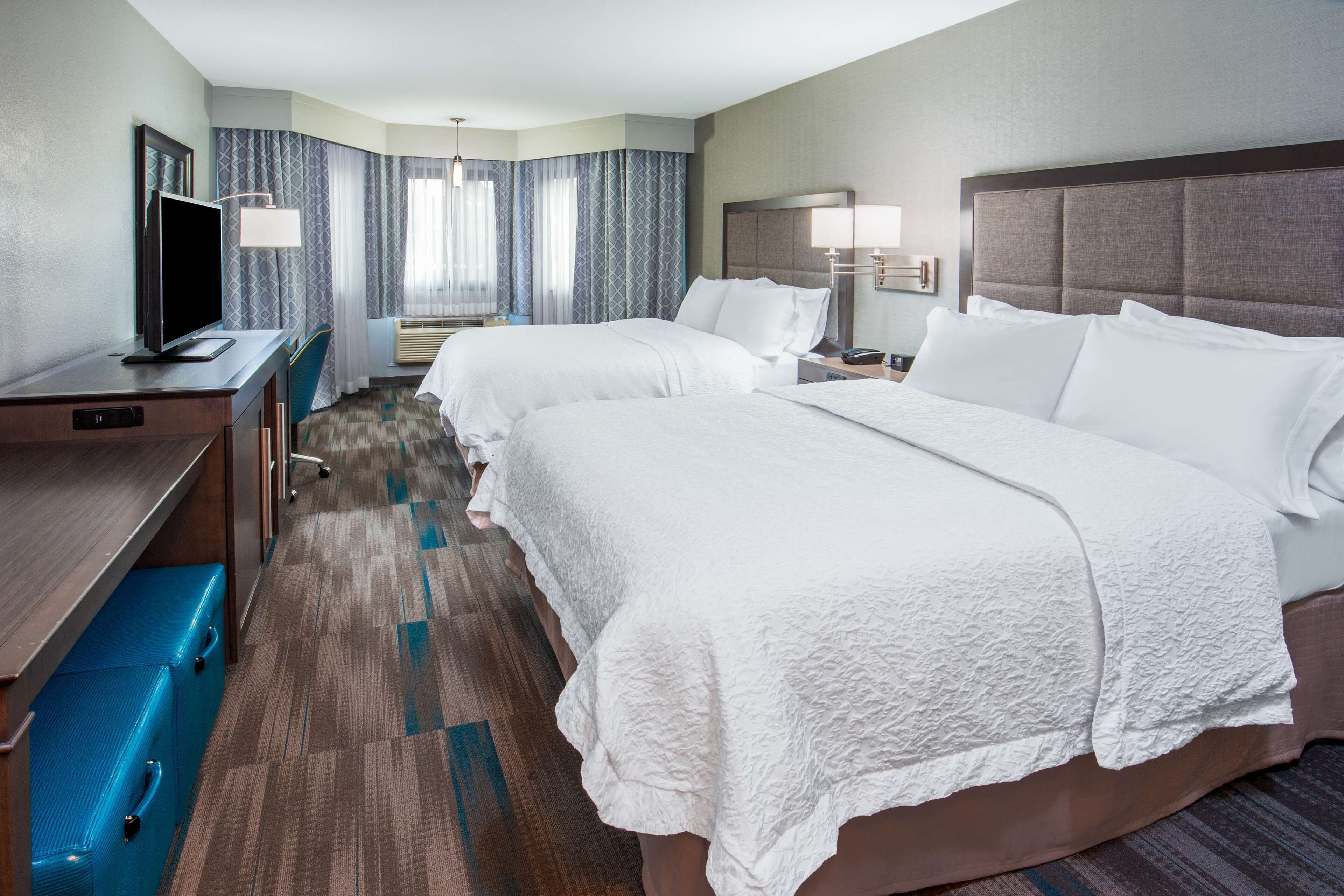 room, 2 queen beds, non smoking, refrigerator | premium bedding, in-room safe, desk, blackout curtains