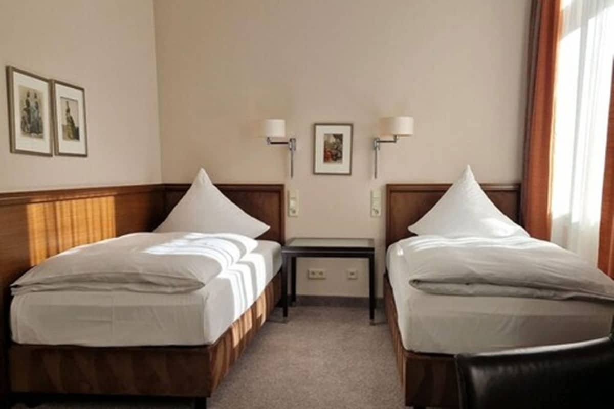Hypoallergeen beddengoed, een minibar, een kluis op de kamer, een bureau