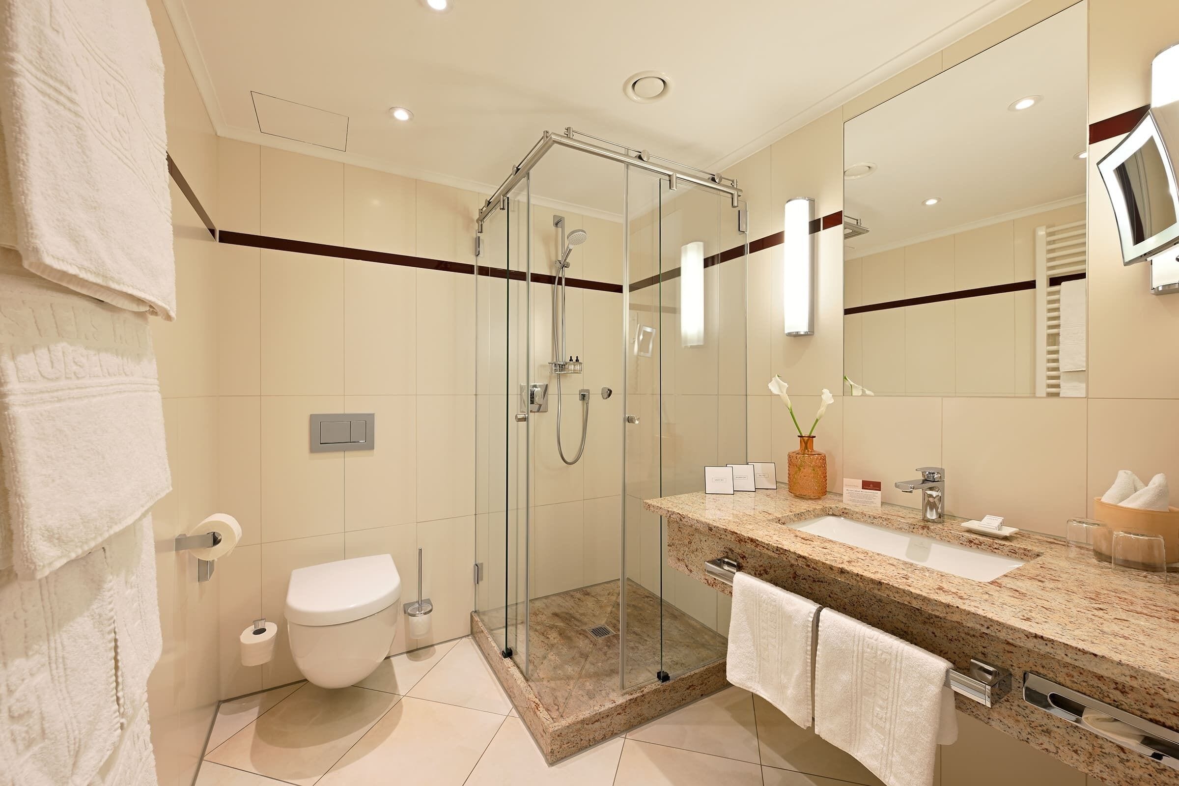 shower, eco-friendly toiletries, hair dryer, bathrobes