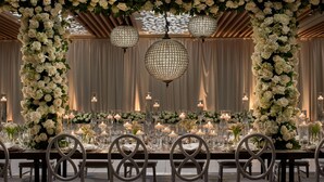 A formal dining setup with a long table, chairs, and floral decorations. - The Westin DC Downtown (Washington)