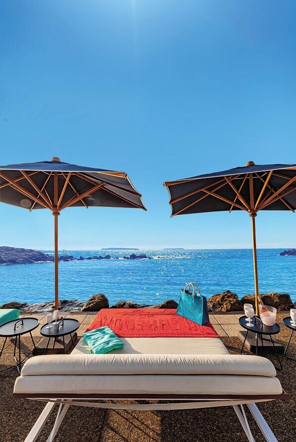 Private beach, sun-loungers, beach umbrellas, beach towels