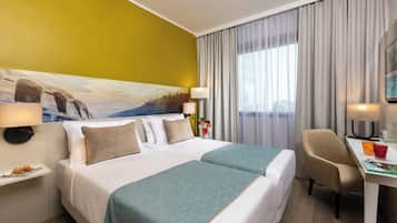 Comfort Room | Minibar, in-room safe, desk, soundproofing