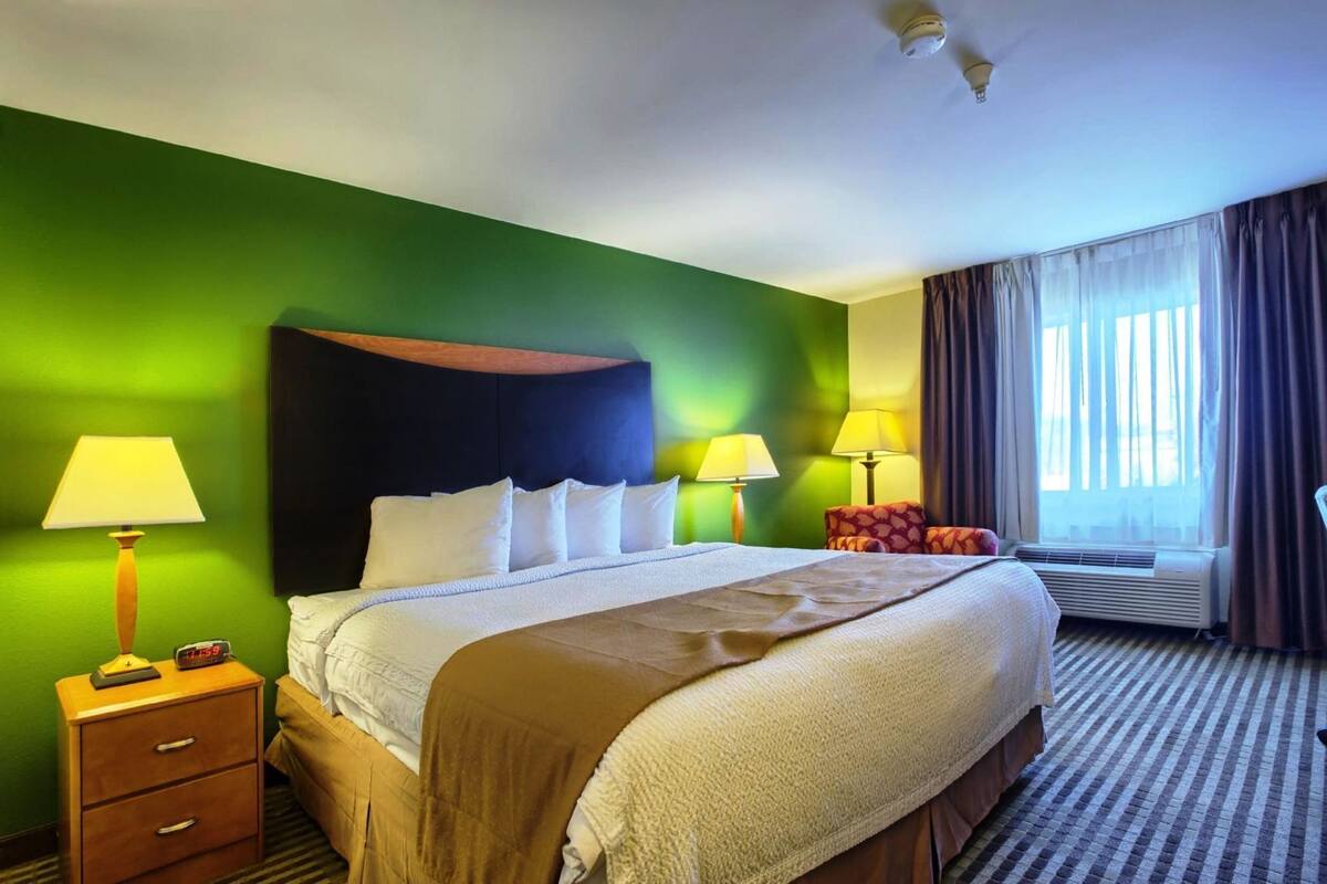 Premium bedding, pillowtop beds, desk, blackout drapes