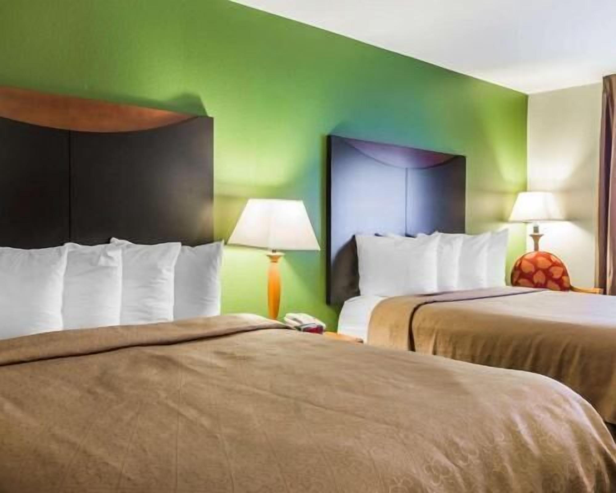 Premium bedding, pillowtop beds, desk, blackout drapes